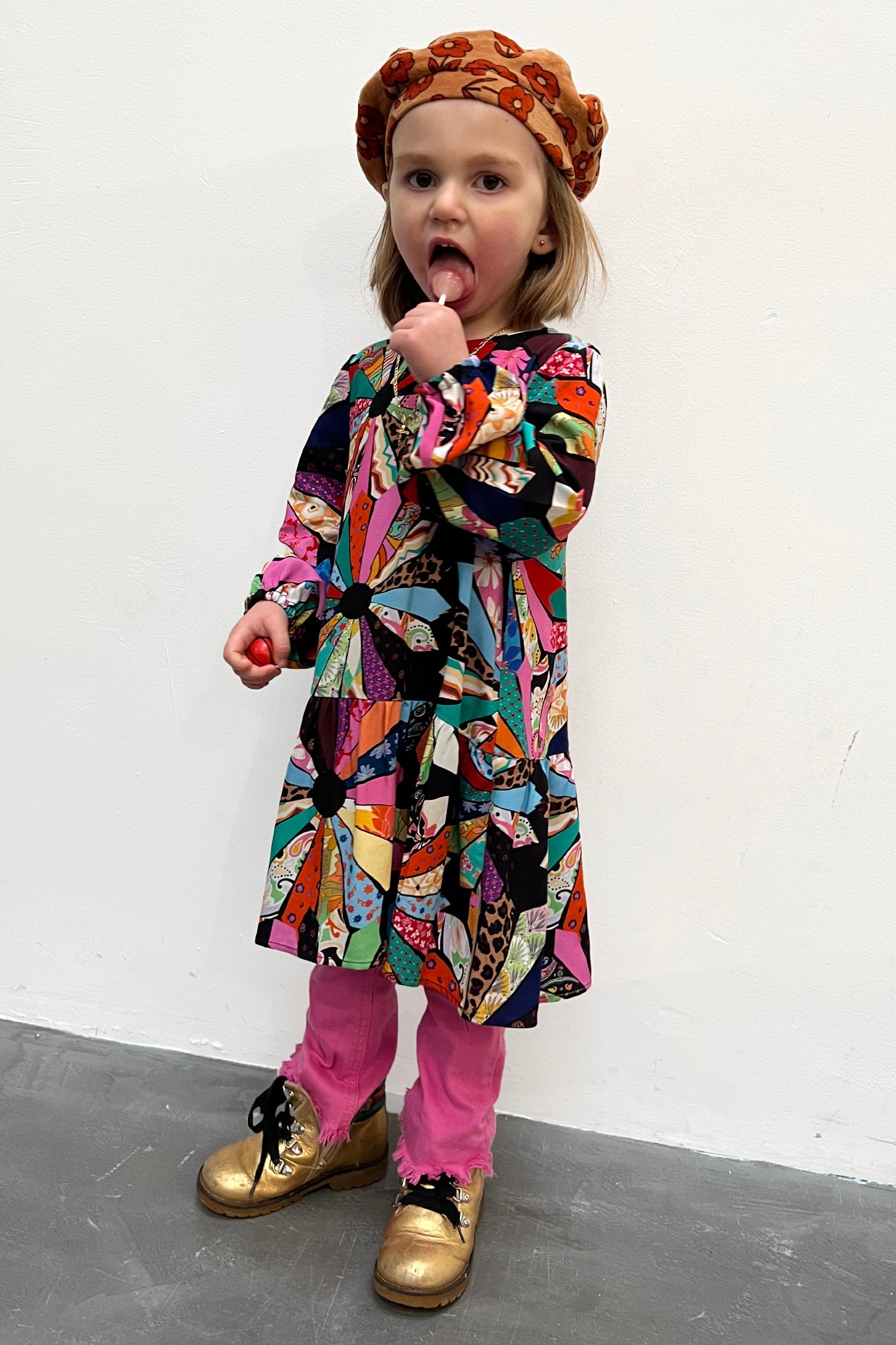 Model wearing NFD Kids Patchwork Dress standing facing the camera