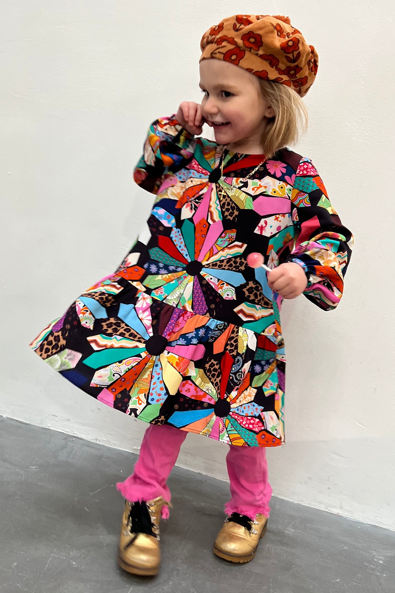 Model wearing NFD Kids Patchwork Dress standing facing the camera