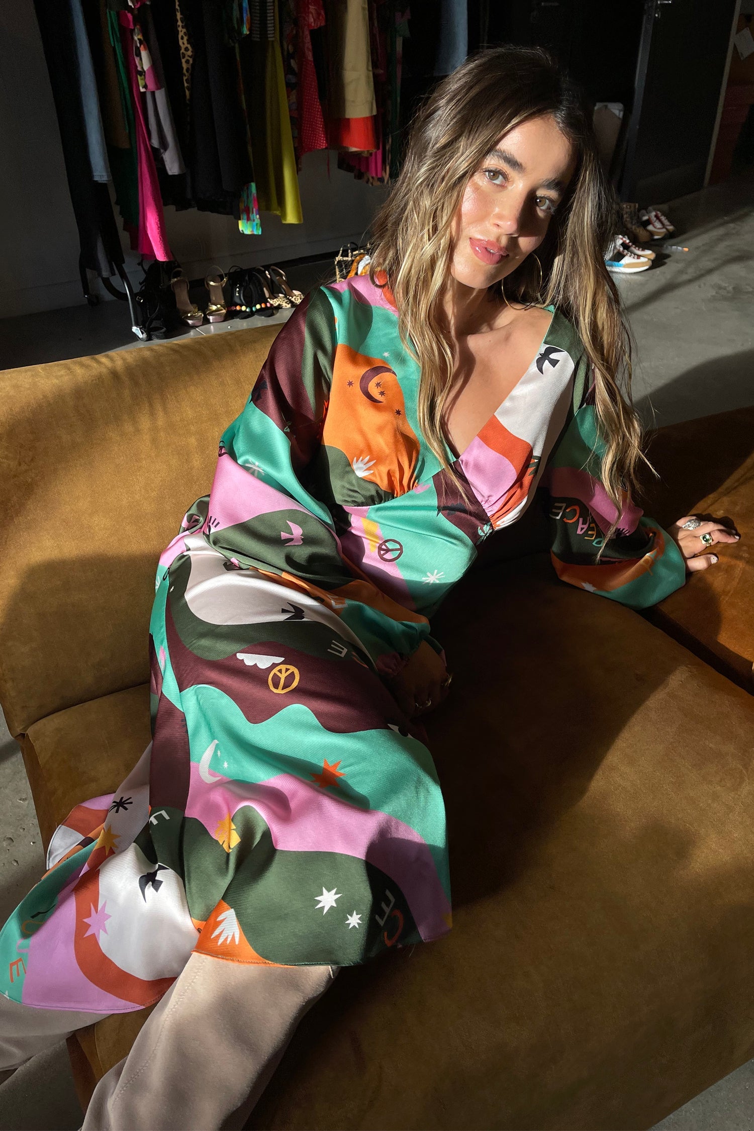 Model wearing Multi Peace And Love Midi Dress standing facing the camera 