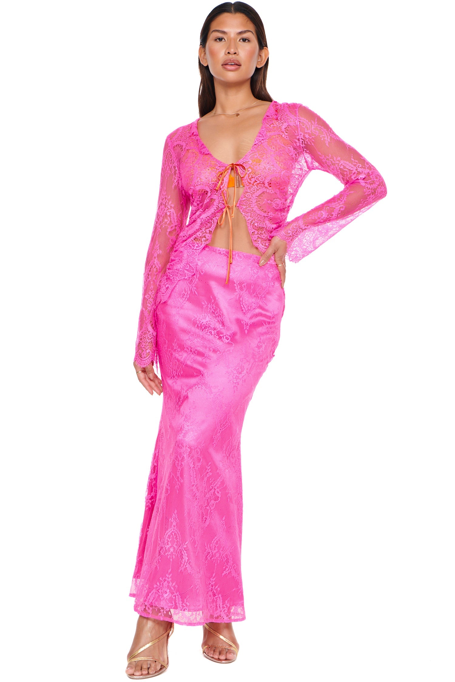 Model wearing Pink Lace Skirt standing facing the camera