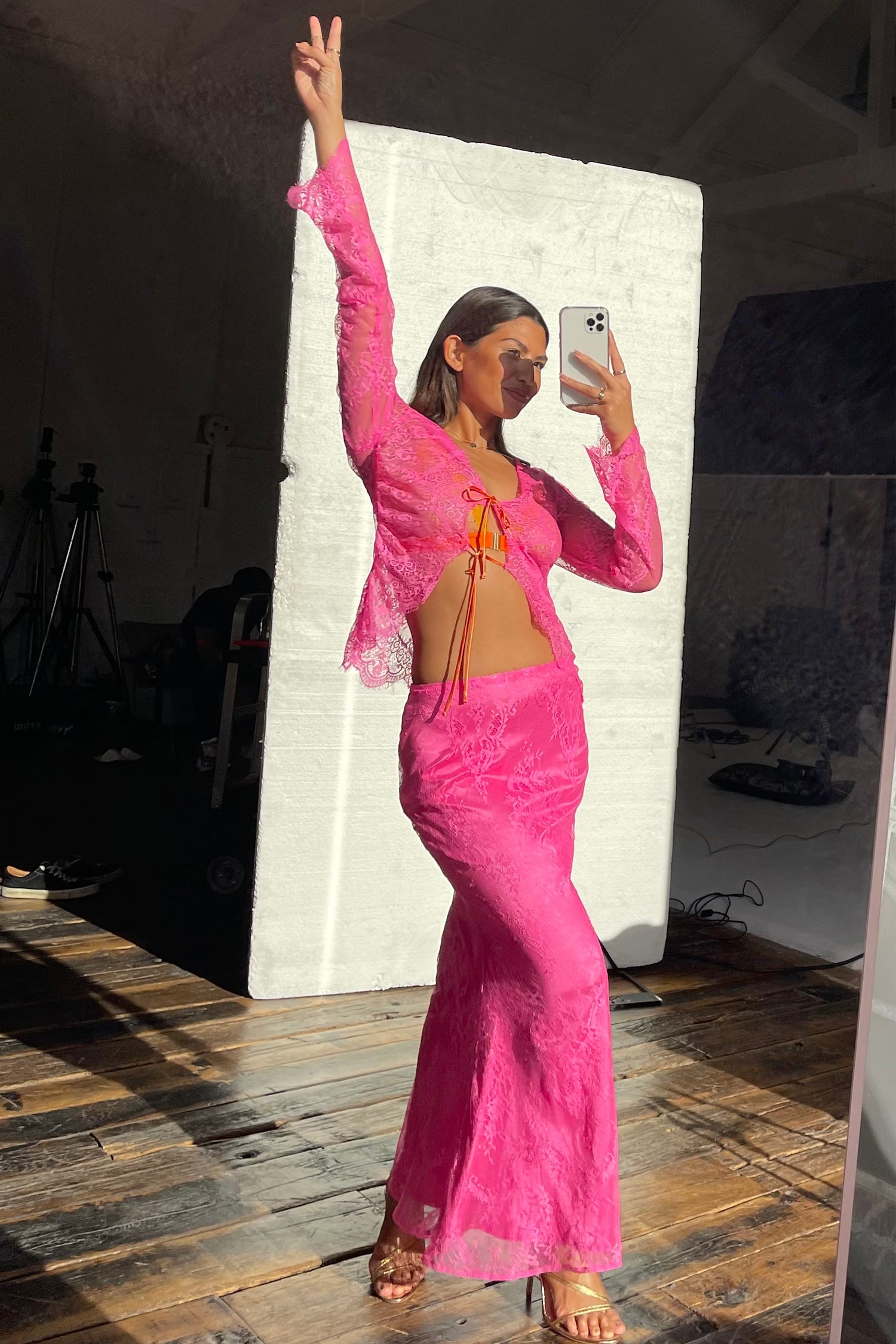 Model wearing Pink Lace Skirt standing facing the camera