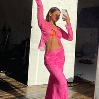 Thumbnail for Model wearing Pink Lace Skirt standing facing the camera