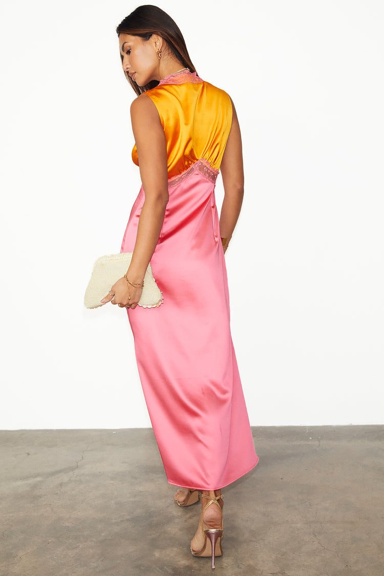 caption_Model wears Orange and Pink Sleeveless May Dress in UK size 10/ US 6