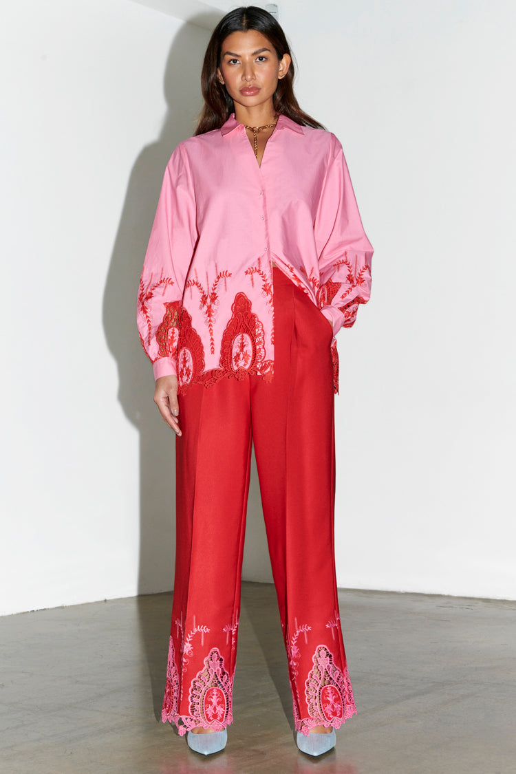 caption_Model wears Red And Pink Arden Trouser in UK size 10/ US 6
