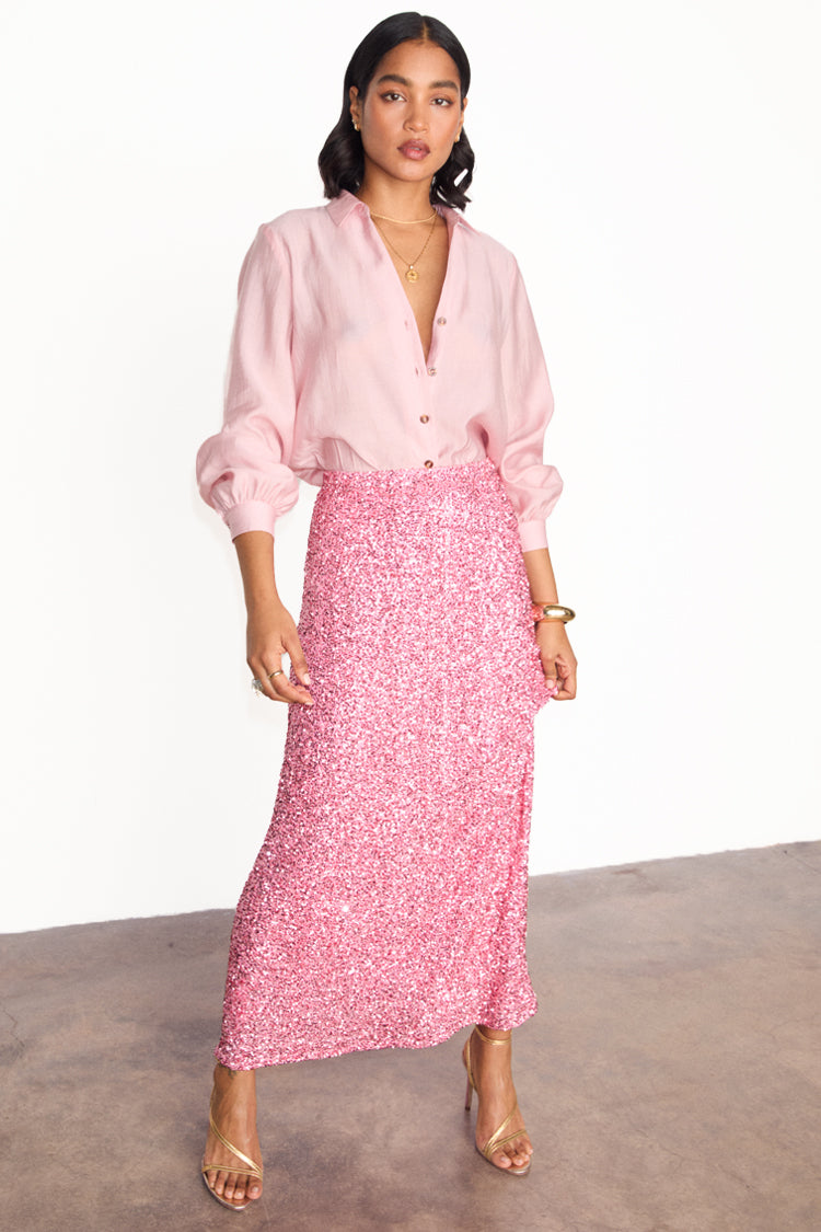 caption_Model wears Pink Sequin Dorris Skirt in UK size 10/ US 6