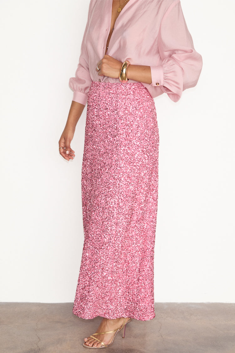 caption_Model wears Pink Sequin Dorris Skirt in UK size 10/ US 6