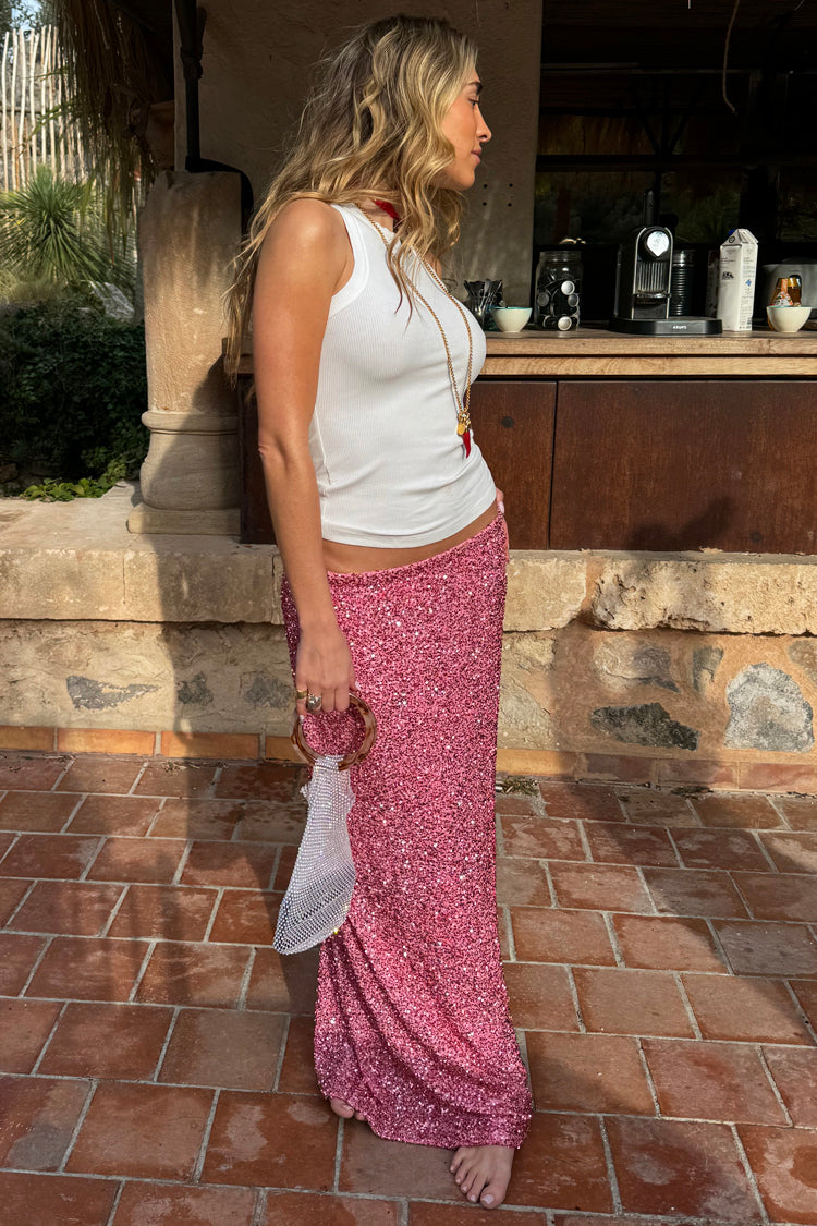 caption_Model wears Pink Sequin Dorris Skirt in UK size 10/ US 6