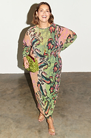 Thumbnail for caption_Model wears Plisse Didi Dress in UK 18 / US 14
