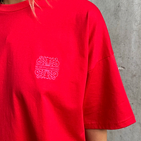 Thumbnail for caption_Model wears Red Solstice T-Shirt in UK size 10/ US 6