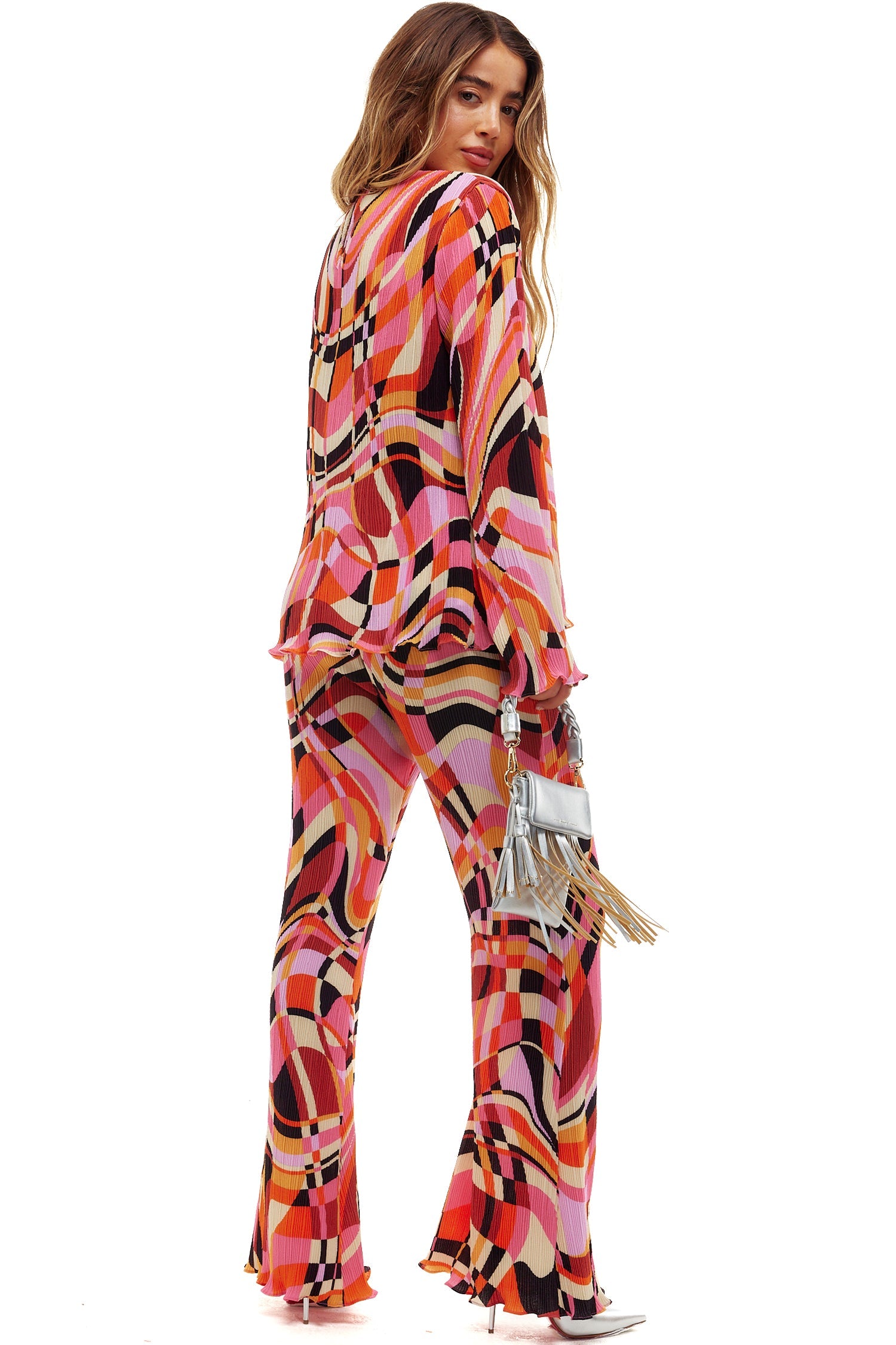 Model wearing Retro Plisse Trouser standing facing away from the camera 