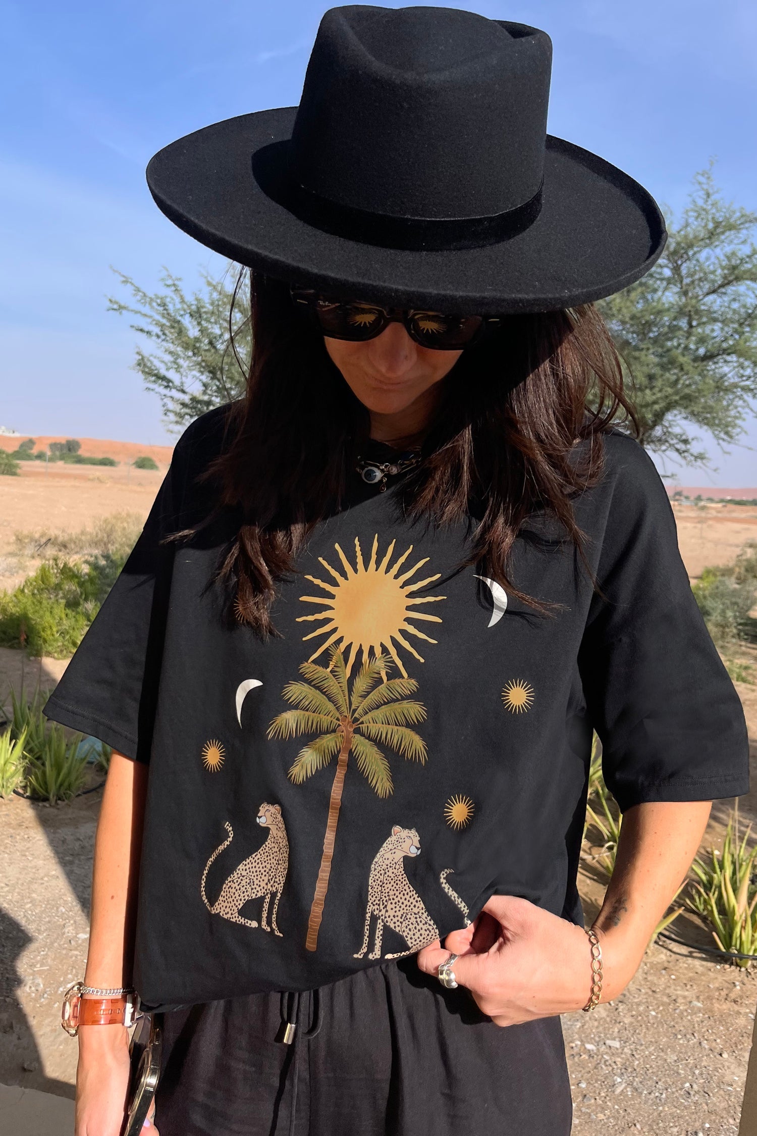 caption_Model wears Running Wild T-Shirt in S
