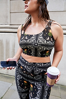 Thumbnail for caption_Model wears  Running Wild Gym Legging in UK size 16/ US 12