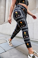 Thumbnail for caption_Model wears  Running Wild Gym Legging in UK size 16/ US 12