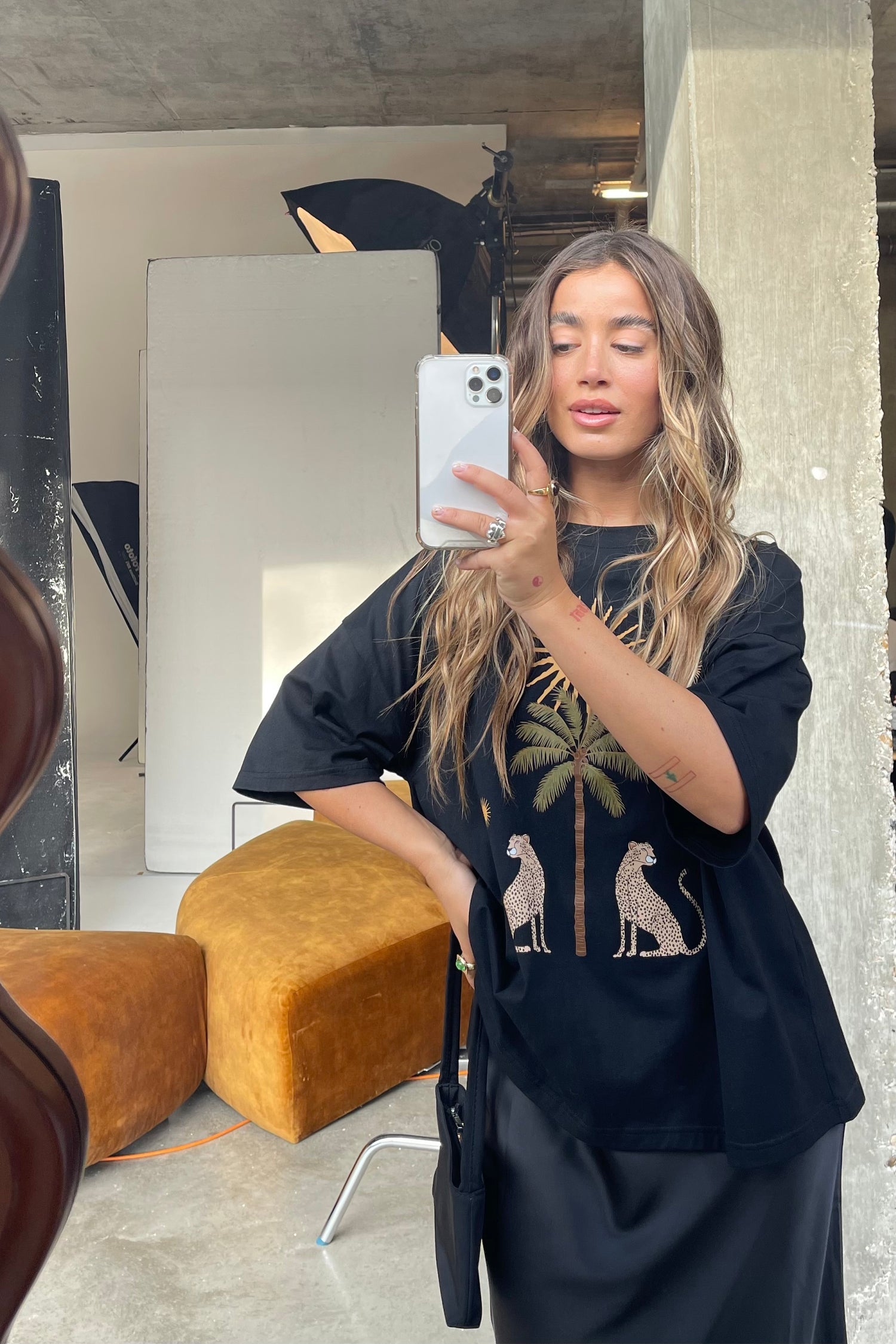 caption_Model wears Running Wild T-Shirt in S