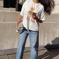 Thumbnail for Model wearing White Running Wild T-Shirt standing facing the camera