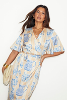 Thumbnail for  caption_Model wears Sicilian Ceryes Wrap Dress in UK size 10/ US 6