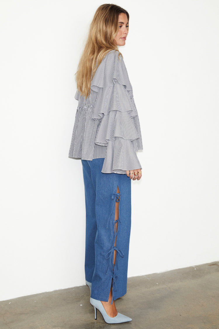 caption_Model wears Denim Tie Side Trousers in UK size 10/ US 6