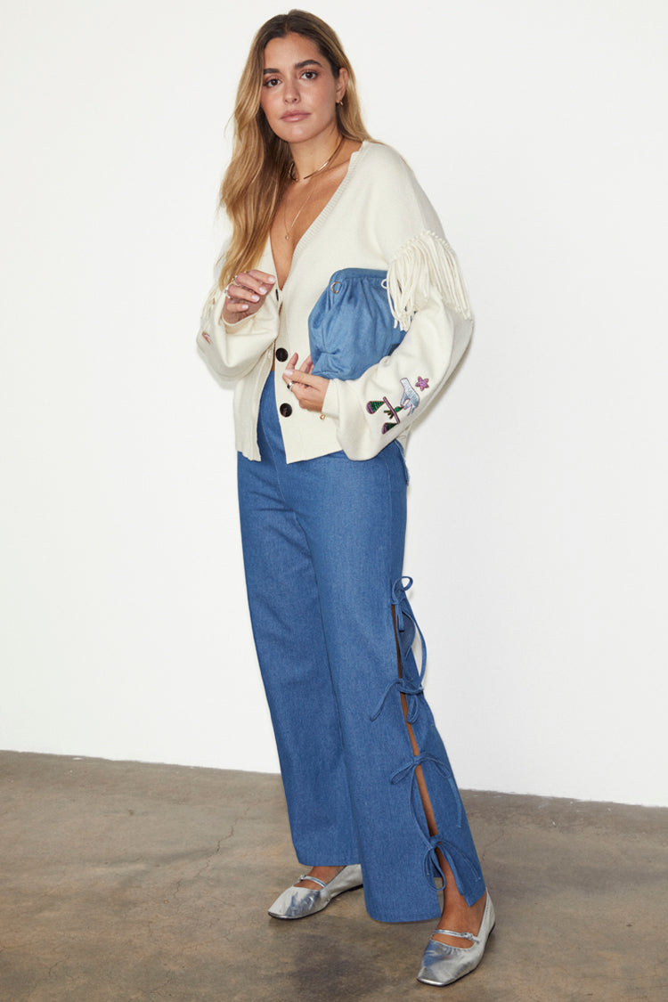 caption_Model wears Denim Tie Side Trousers in UK size 10/ US 6