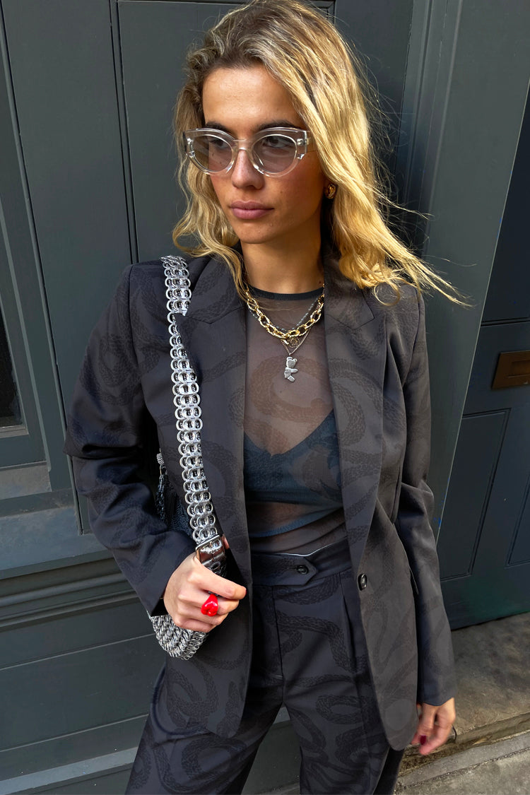  caption_Model wears Snake Mesh Top in UK size 10/ US 6