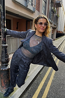 Thumbnail for caption_Model wears Snake Mesh Top in UK size 10/ US 6