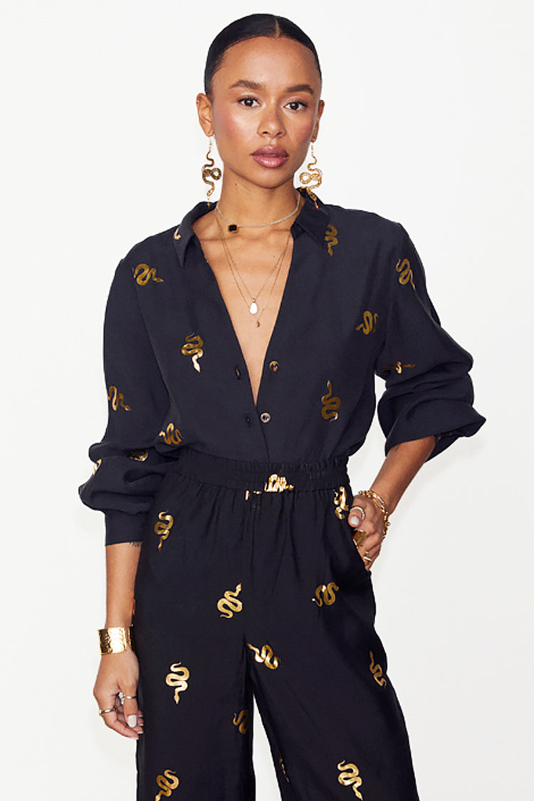 caption_Model wears Black Gold Snake Miley Shirt in UK size 10/ US 6