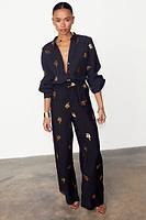Thumbnail for caption_Model wears Black Gold Snake Elissa Trousers in UK size 10/ US 6