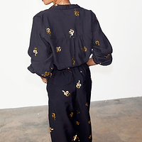 Thumbnail for caption_Model wears Black Gold Snake Elissa Trousers in UK size 10/ US 6