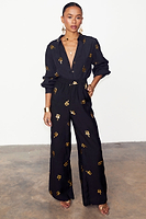 Thumbnail for caption_Model wears Black Gold Snake Elissa Trousers in UK size 10/ US 6