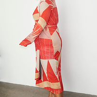 Thumbnail for caption_Model wears Reversible Sundial Wrap Dress in UK size 18 / US 14