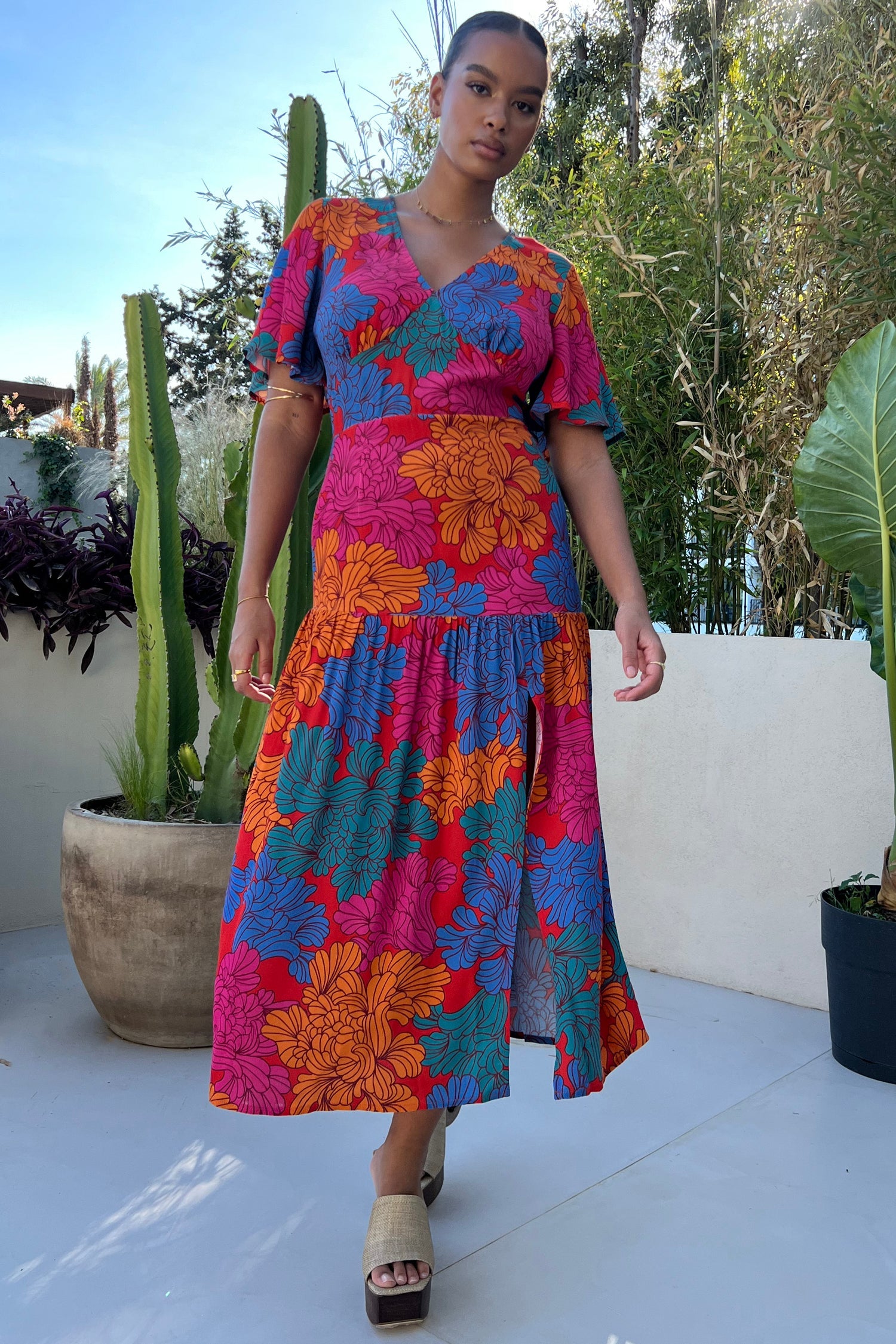 Model wearing Tabitha Floral Clover Dress facing towards the camera 