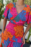 Thumbnail for Model wearing Tabitha Floral Clover Dress facing towards the camera close up