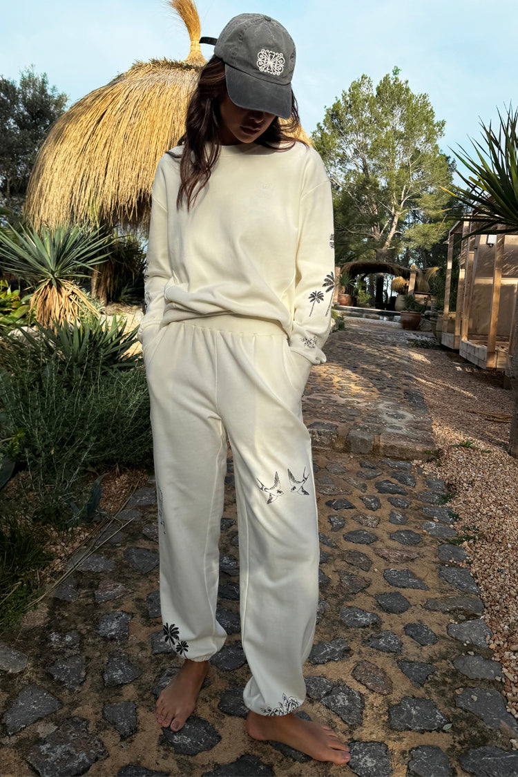caption_Model wears White Tattoo Joggers in UK size 10/ US 6