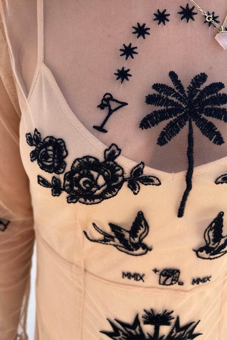 Model wearing Embellished Mesh Tattoo Dress