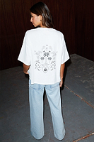 Thumbnail for caption_Model wears White Tattoo T-Shirt in size S