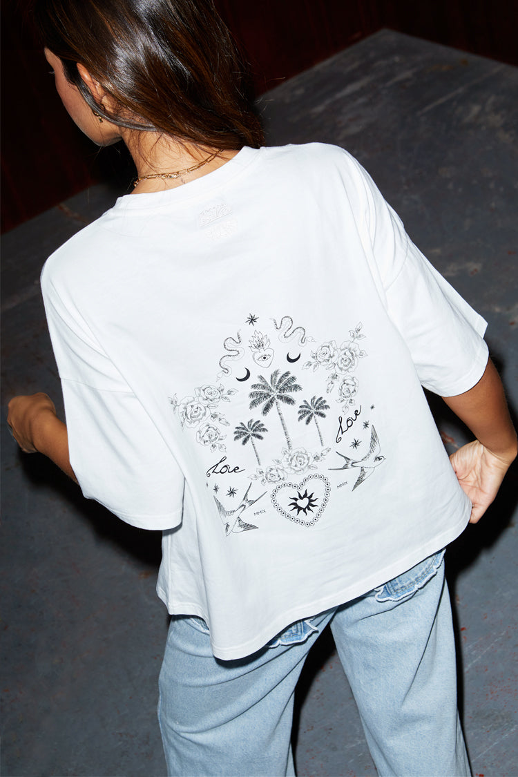 caption_Model wears White Tattoo T-Shirt in size S