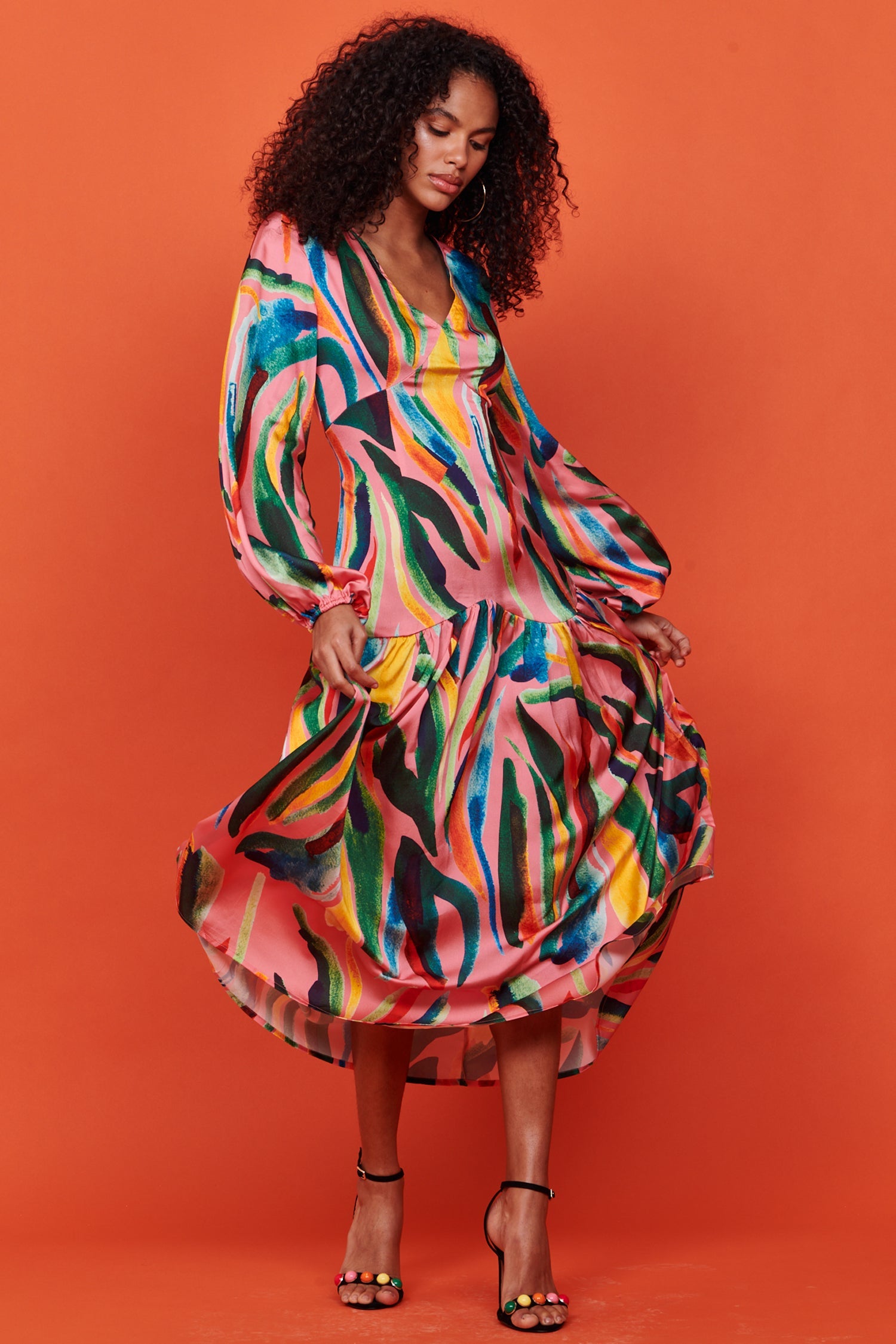 Model wearing Tropical Sophie Dress standing facing the camera