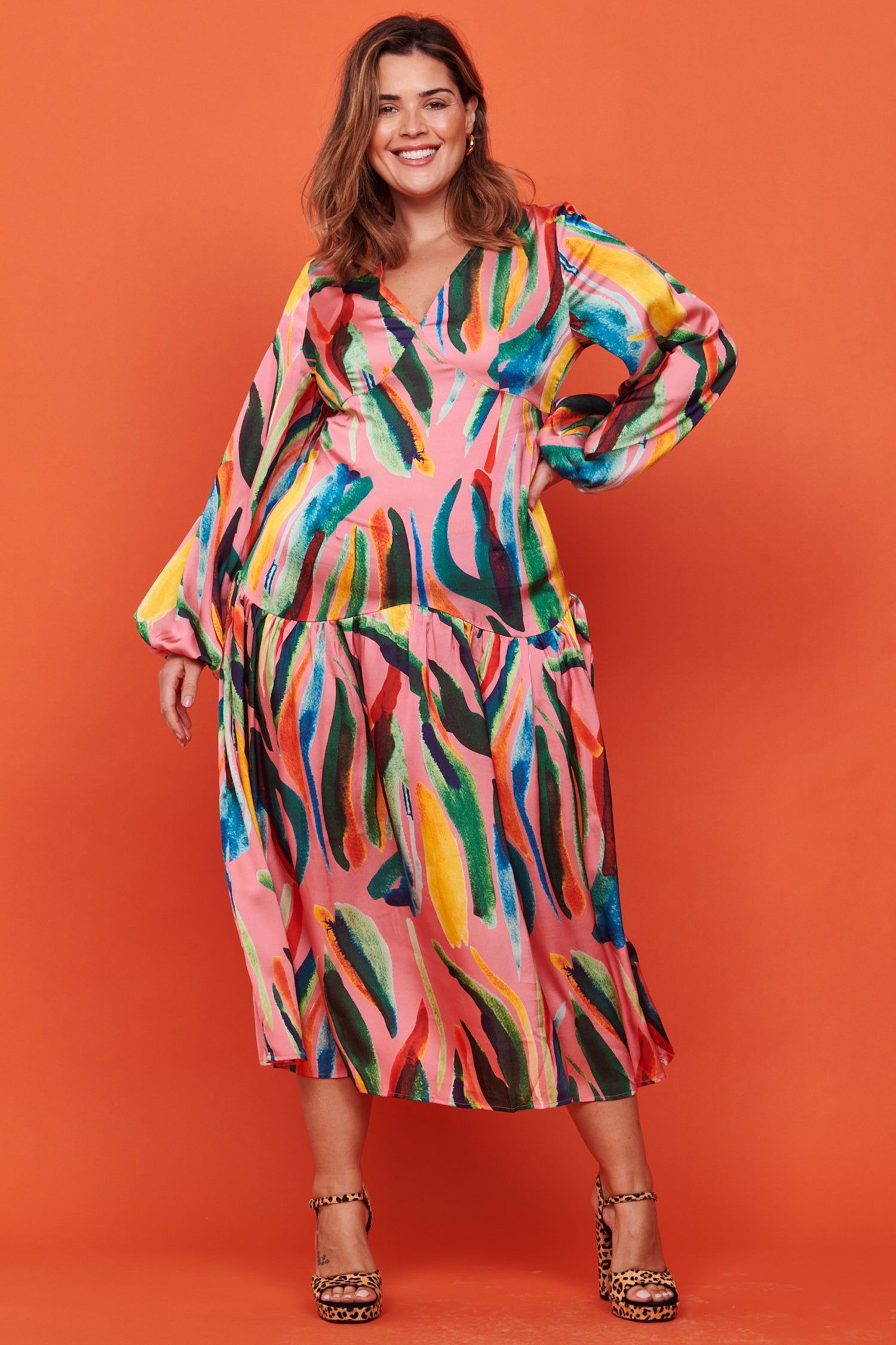 Model wearing Tropical Sophie Dress standing facing the camera