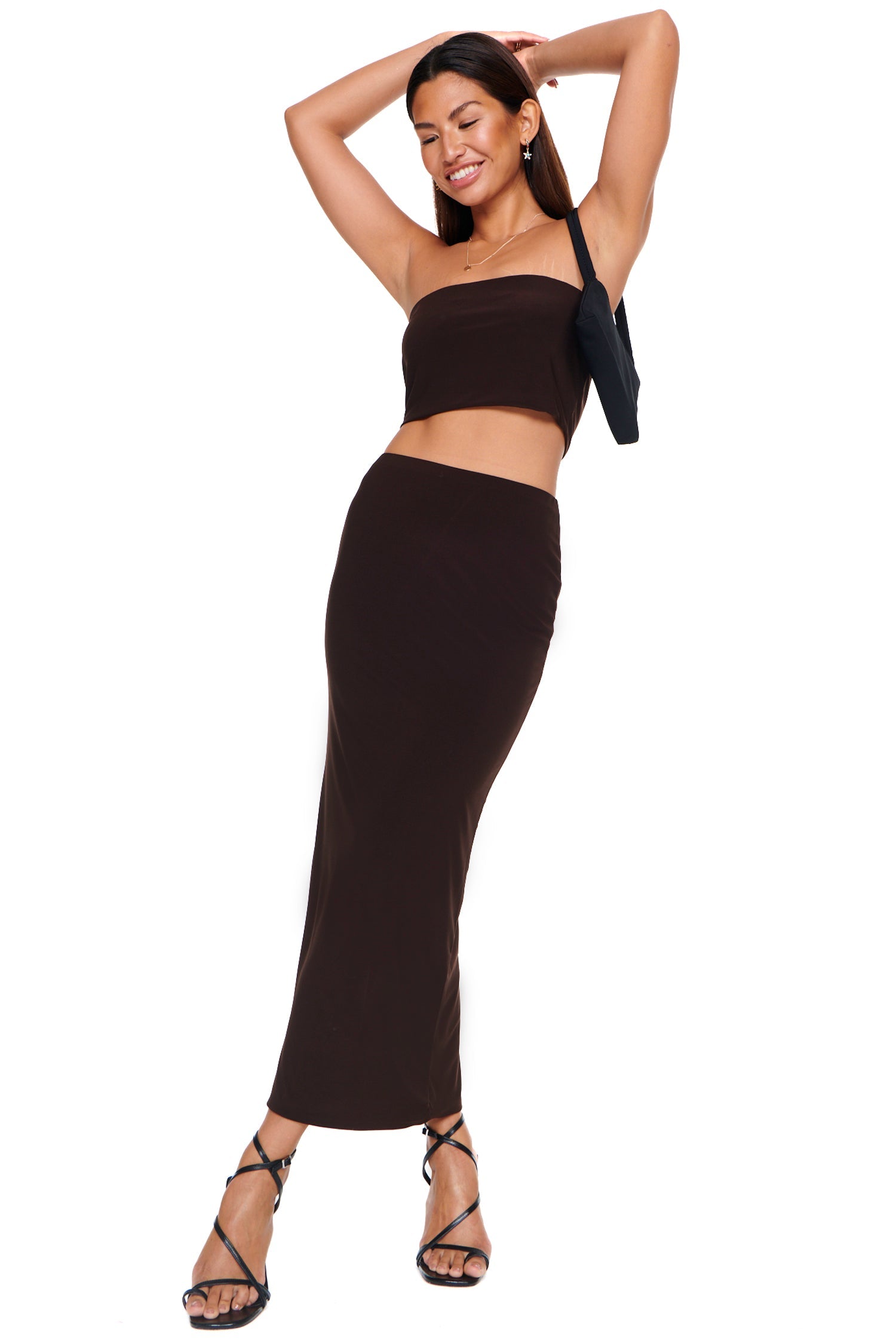 Model wearing Brown Boob Tube standing facing the camera