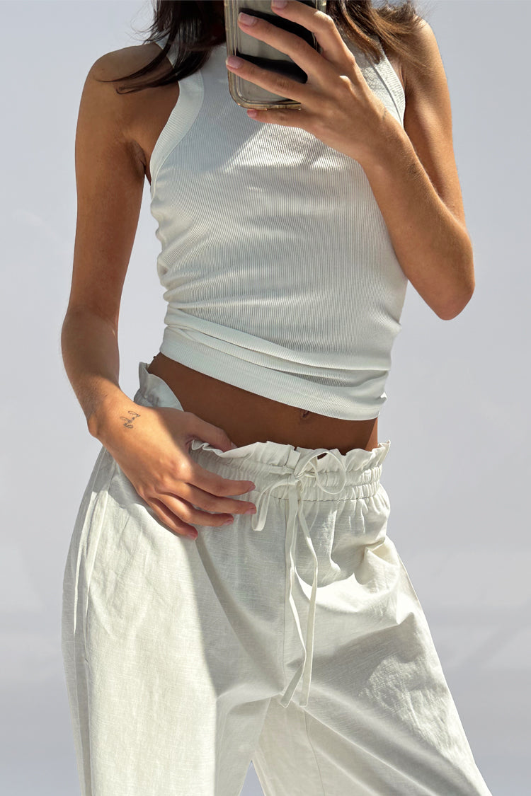 caption_Model wears White Cotton Ribbed Tank  in size S