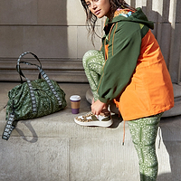 Thumbnail for caption_Model wears Khaki and Orange NFD Windbreaker in UK size 16/ US 12