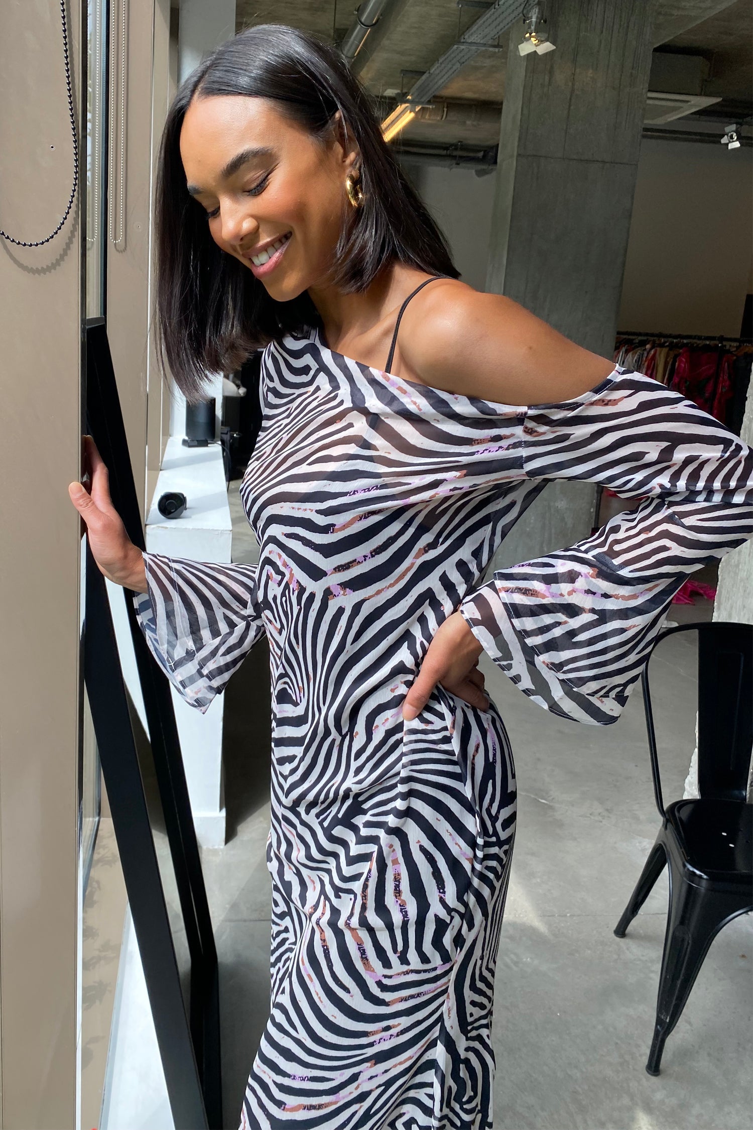 Model wearing Zebra Ophelia Dress standing facing camera close up