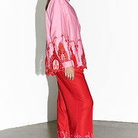 Thumbnail for caption_Model wears Red And Pink Arden Trouser in UK size 10/ US 6