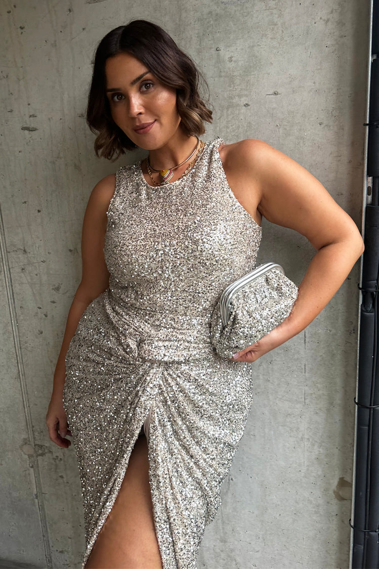 caption_Model wears Silver Sequin Tank Top in UK size 18/ US 14