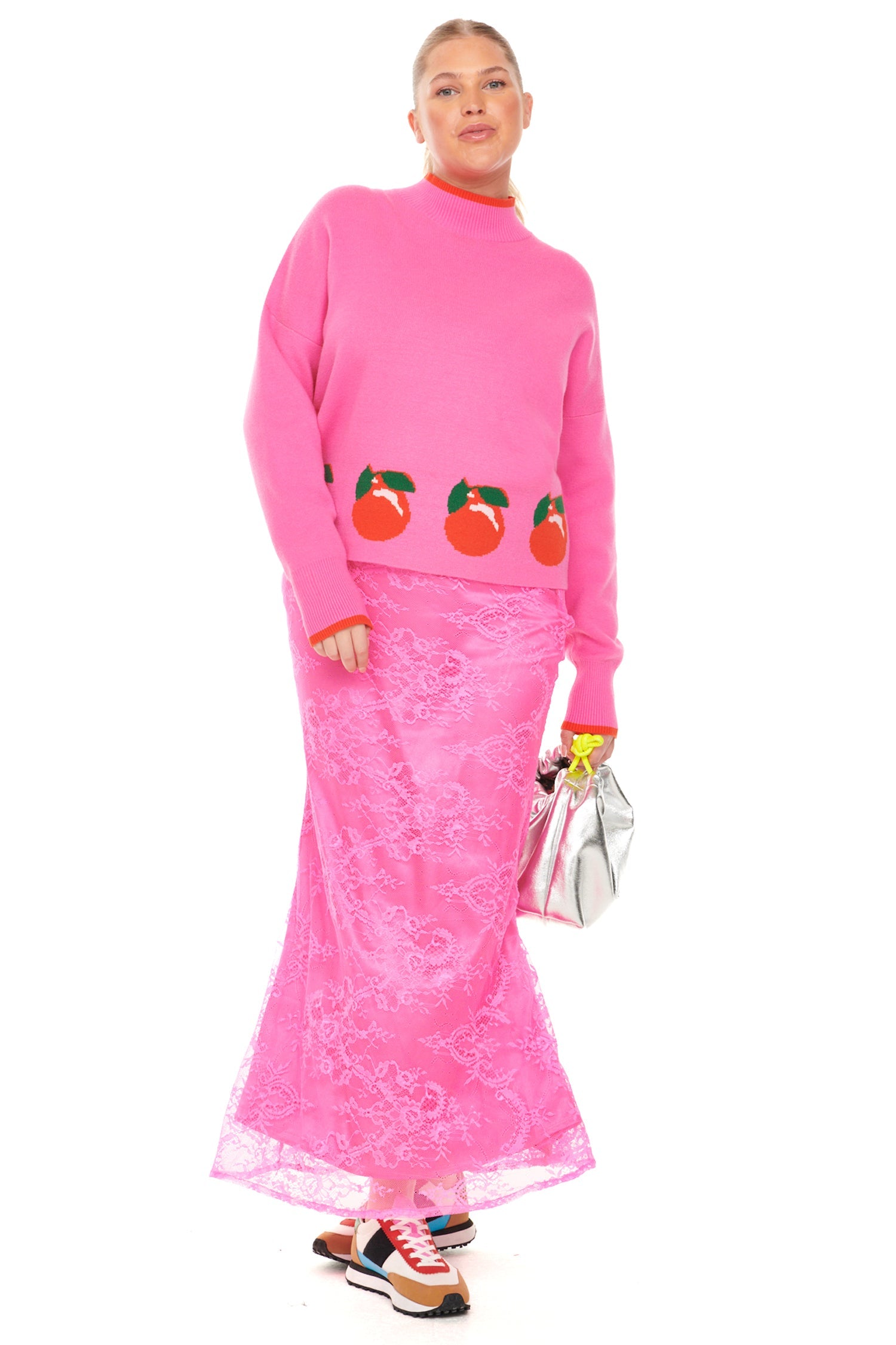 Model wearing Pink Alba Fruit Jumper standing facing the camera