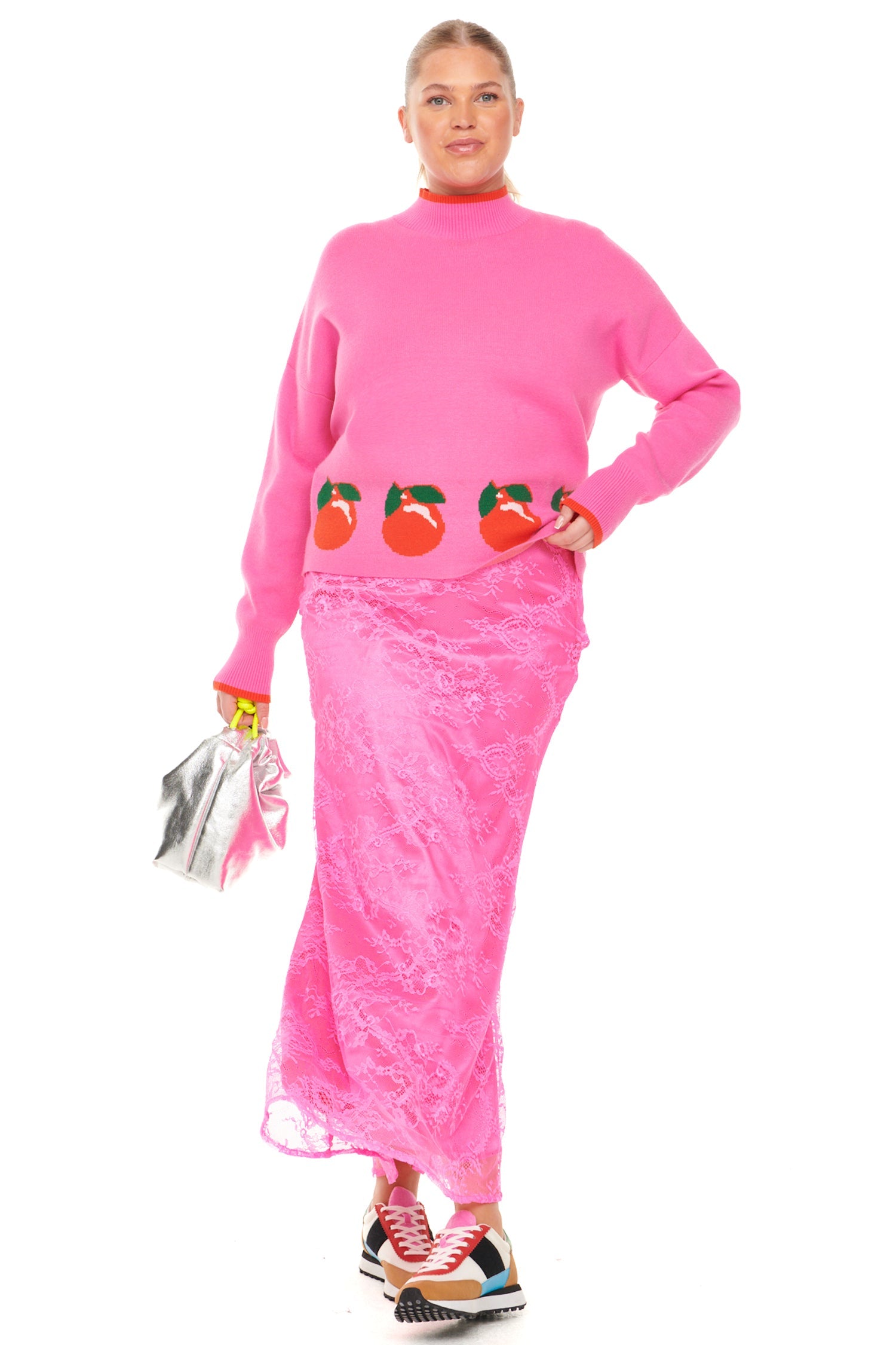 Model wearing Pink Alba Fruit Jumper standing facing the camera