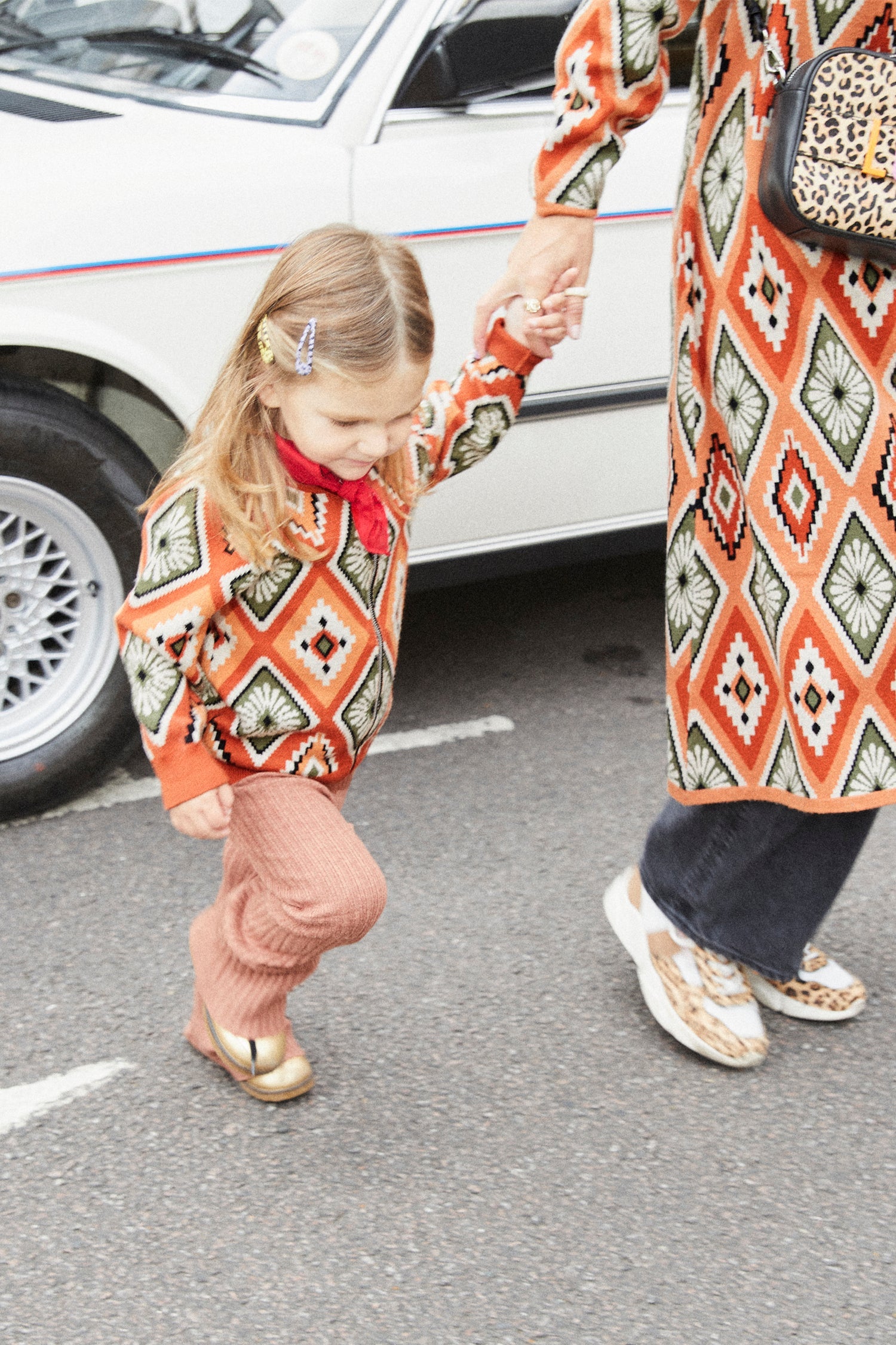 Model wearing NFD Kids Diamond Bomber standing facing the camera 