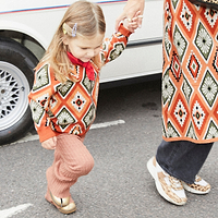Thumbnail for Model wearing NFD Kids Diamond Bomber standing facing the camera 