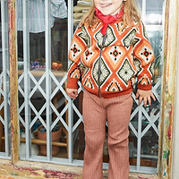 Thumbnail for Model wearing NFD Kids Diamond Bomber standing facing the camera 