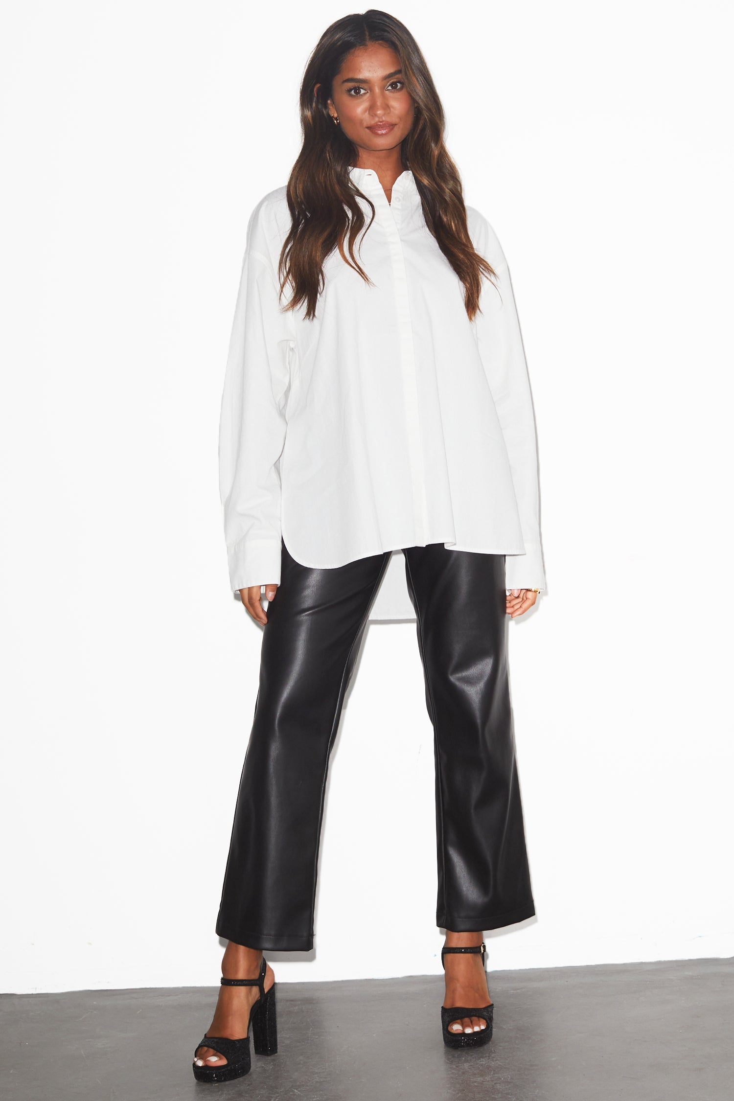 Model wearing Heart Back Shirt standing facing the camera 