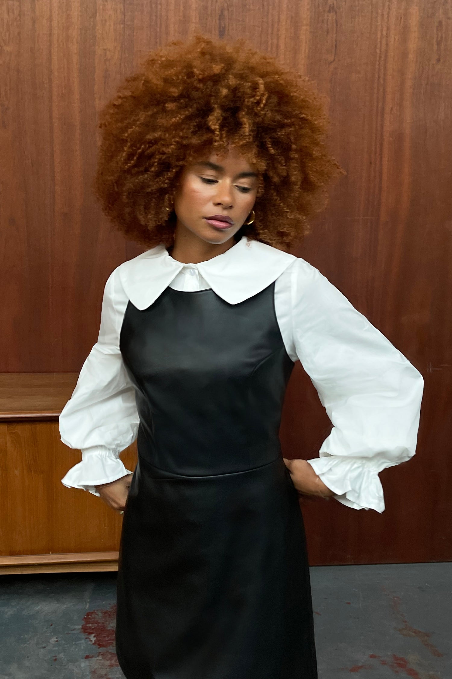 Model wearing White Layla Shirt standing facing the camera